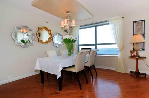 474 N Lake Shore Dr Unit 4808, Chicago, IL 60611 - dining room with baseboards, a chandelier, and wood finished floors