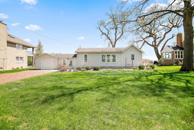 ranch-style house with a garage, driveway, and a front yard