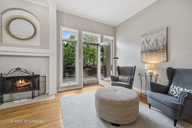 874 W Goodrich Pl, Palatine, IL 60067 - sitting room with crown molding, wood finished floors, and a tiled fireplace