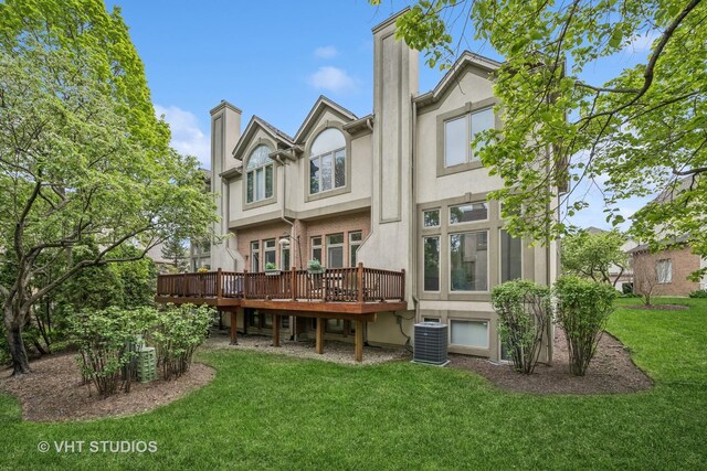 874 W Goodrich Pl, Palatine, IL 60067 - rear view of house with a chimney, a deck, central AC, a lawn, and stucco siding