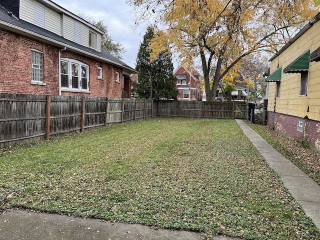 view of yard with a fenced backyard