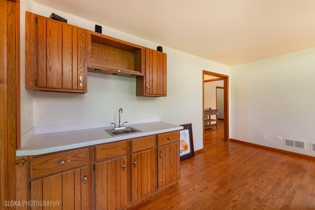 1 Byron Ct, Hawthorn Woods, IL 60047 - kitchen featuring a sink and brown cabinetry