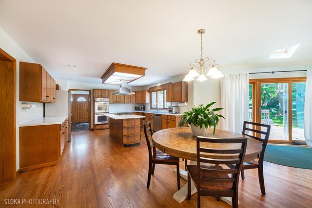 1 Byron Ct, Hawthorn Woods, IL 60047 - dining room with wood finished floors and a chandelier