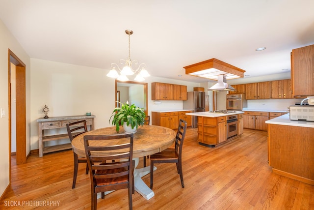 1 Byron Ct, Hawthorn Woods, IL 60047 - dining room featuring light wood-style flooring and a chandelier