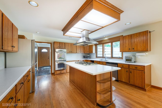 1 Byron Ct, Hawthorn Woods, IL 60047 - kitchen featuring stainless steel appliances, island exhaust hood, brown cabinetry, light wood-style floors, and recessed lighting