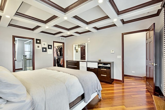 5912 N NW Hwy, Chicago, IL 60631 - bedroom with wood finished floors, beamed ceiling, coffered ceiling, a walk in closet, and baseboards