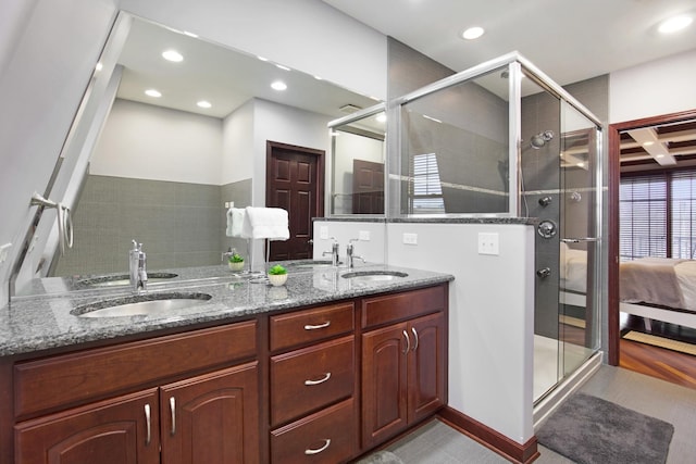 5912 N NW Hwy, Chicago, IL 60631 - ensuite bathroom featuring a stall shower, double vanity, and recessed lighting