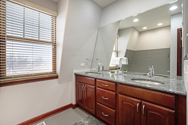 5912 N NW Hwy, Chicago, IL 60631 - bathroom featuring double vanity and baseboards