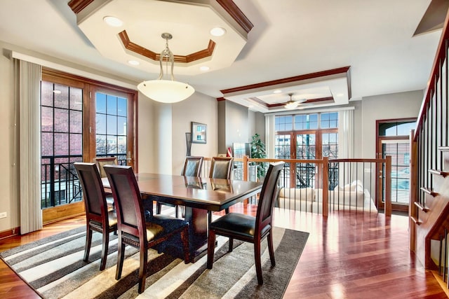 5912 N NW Hwy, Chicago, IL 60631 - dining space featuring a raised ceiling, wood finished floors, a ceiling fan, crown molding, and stairs