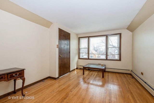 6004 S Kolmar Ave, Chicago, IL 60629 - interior space featuring light wood-type flooring, baseboards, and baseboard heating
