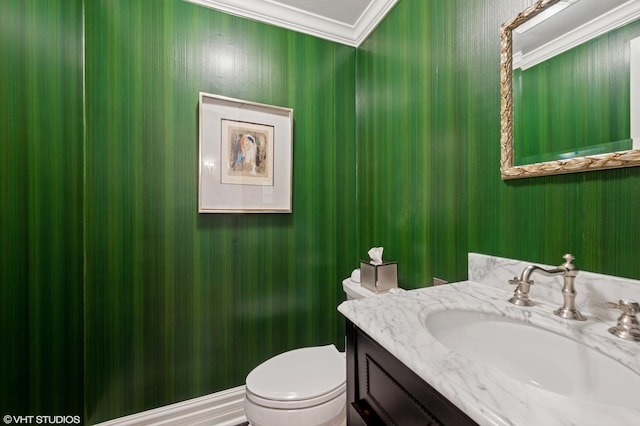 2535 N Burling St, Chicago, IL 60614 - bathroom with crown molding, toilet, and vanity