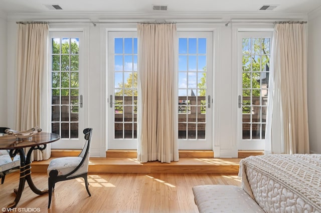 2535 N Burling St, Chicago, IL 60614 - doorway featuring ornamental molding and wood finished floors