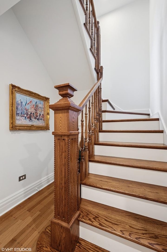 2535 N Burling St, Chicago, IL 60614 - stairway with baseboards and wood finished floors