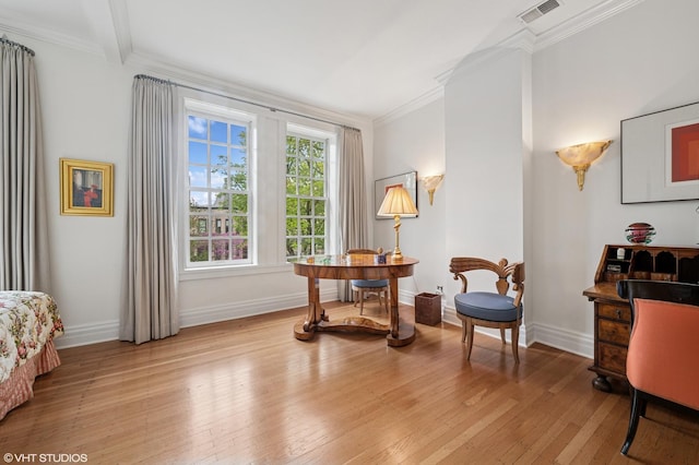 2535 N Burling St, Chicago, IL 60614 - sitting room featuring crown molding, light wood finished floors, and baseboards