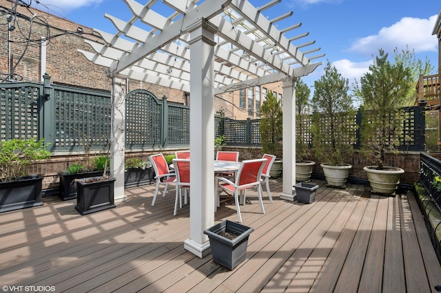 2535 N Burling St, Chicago, IL 60614 - wooden deck featuring outdoor dining area and a pergola