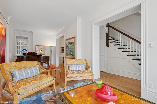 2535 N Burling St, Chicago, IL 60614 - living area with wood finished floors, stairway, crown molding, and baseboards