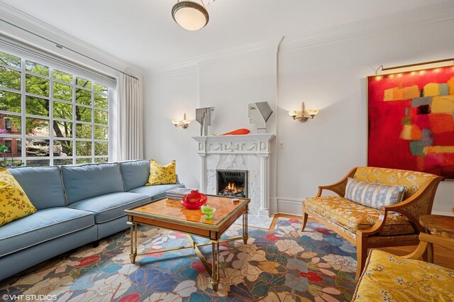 2535 N Burling St, Chicago, IL 60614 - living room featuring crown molding, a fireplace, and wood finished floors
