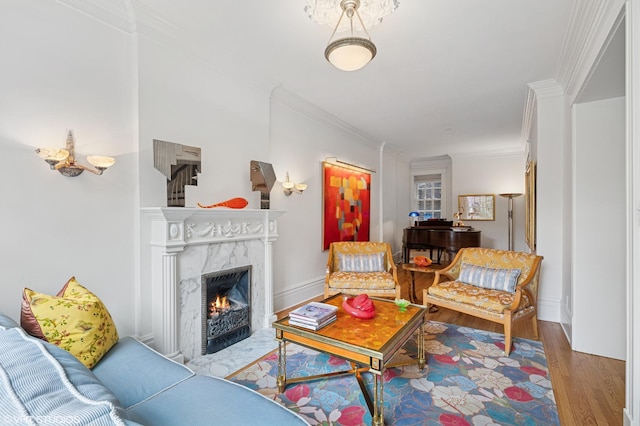 2535 N Burling St, Chicago, IL 60614 - living room featuring crown molding, wood finished floors, and a premium fireplace
