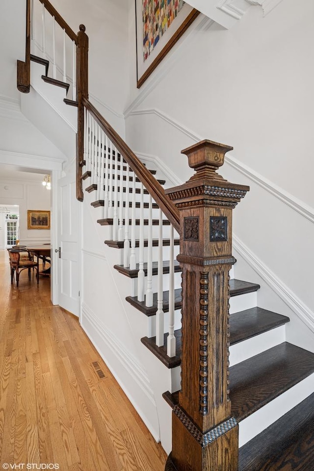 2535 N Burling St, Chicago, IL 60614 - stairway with wood finished floors and a high ceiling