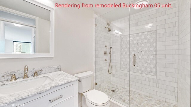 full bath featuring vanity, toilet, and a shower stall