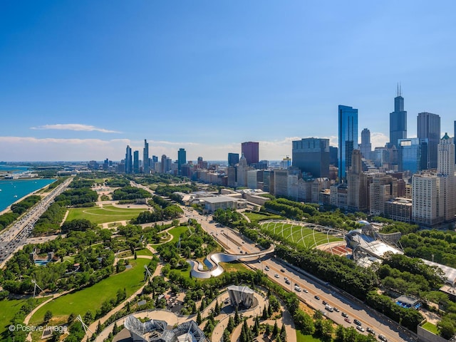 aerial view with a city view and a water view