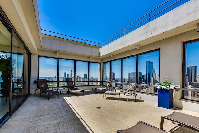 view of patio / terrace featuring a city view