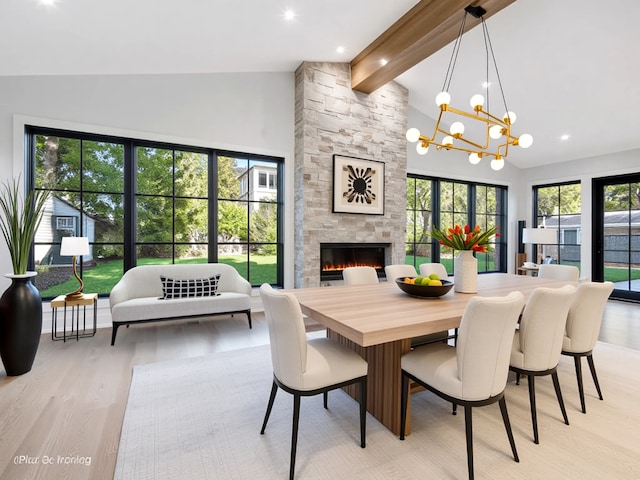 118 Lockerbie Ln, Wilmette, IL 60091 - dining room featuring high vaulted ceiling, beamed ceiling, a fireplace, light wood finished floors, and a chandelier