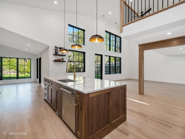 118 Lockerbie Ln, Wilmette, IL 60091 - kitchen featuring open floor plan, a sink, dishwasher, light wood-style floors, and high vaulted ceiling