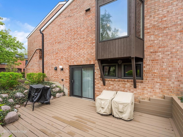 wooden terrace with grilling area
