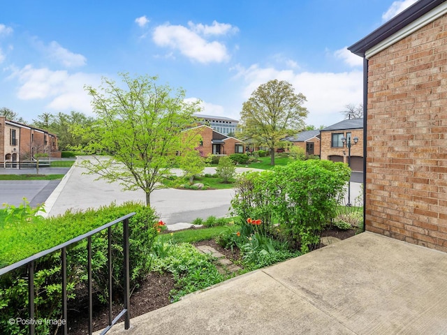 view of yard featuring a residential view