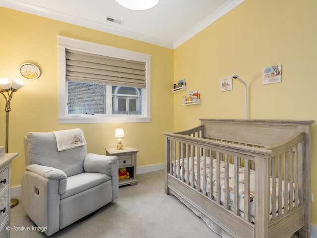 bedroom featuring carpet, a crib, ornamental molding, and baseboards
