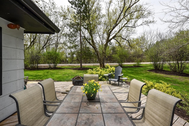 view of patio / terrace featuring a fire pit