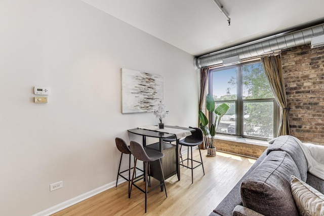 1735 W Diversey Pkwy Unit 206, Chicago, IL 60614 - dining room with light wood-style floors and track lighting