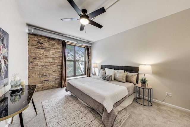 1735 W Diversey Pkwy Unit 206, Chicago, IL 60614 - carpeted bedroom featuring brick wall and a ceiling fan