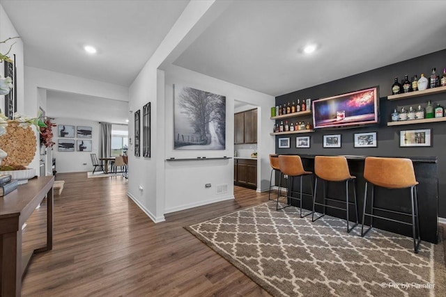 10102 Jonamac Ave, Huntley, IL 60142 - indoor dry bar with dark wood-type flooring and baseboards