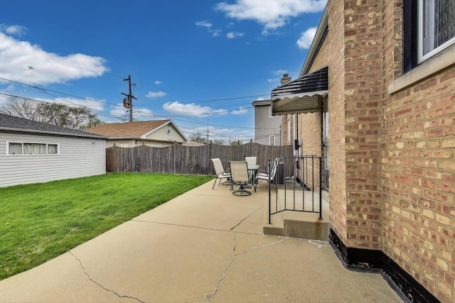 view of patio / terrace featuring a fenced backyard and outdoor dining space