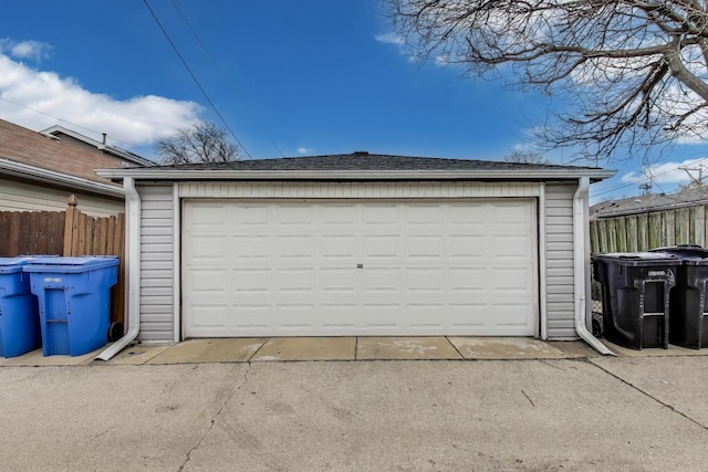detached garage with fence