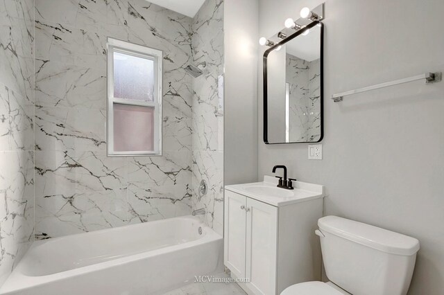 full bathroom featuring toilet, shower / tub combination, and vanity
