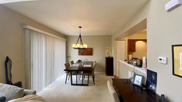 4434 Edinburg Ln Unit 0, Hanover Park, IL 60133 - dining area with light colored carpet and a chandelier