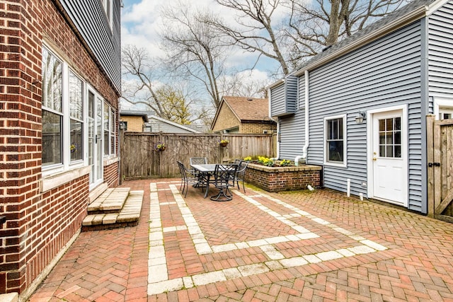 view of patio / terrace featuring a fenced backyard and outdoor dining area