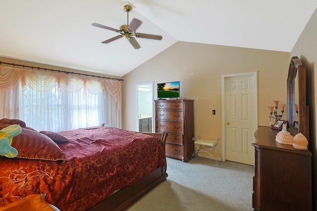 carpeted bedroom with ceiling fan and lofted ceiling