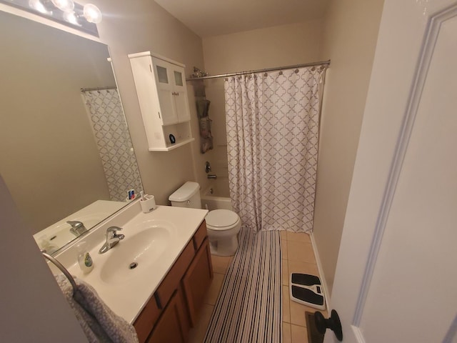 368 W Winchester Dr, Round Lake, IL 60073 - bathroom featuring vanity, shower / tub combo with curtain, tile patterned floors, and toilet