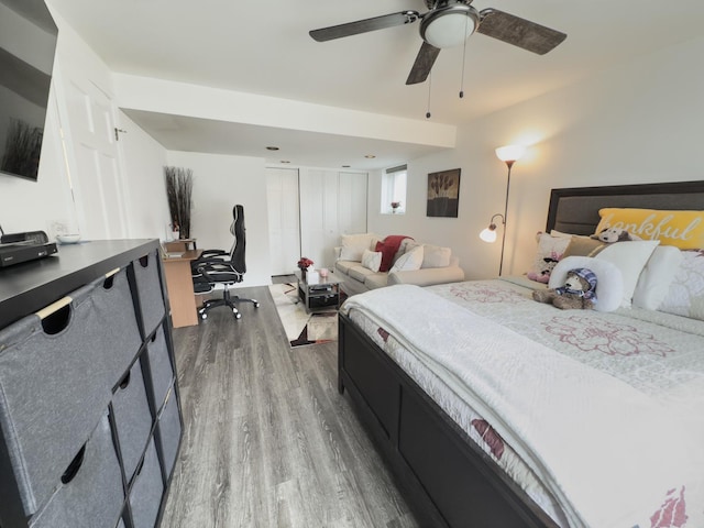 bedroom featuring ceiling fan and wood finished floors