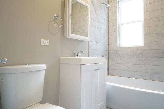 2957 N Avers Ave, Chicago, IL 60618 - bathroom featuring toilet, vanity, and shower / washtub combination