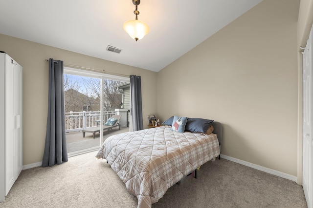 carpeted bedroom with baseboards, access to outside, lofted ceiling, and visible vents
