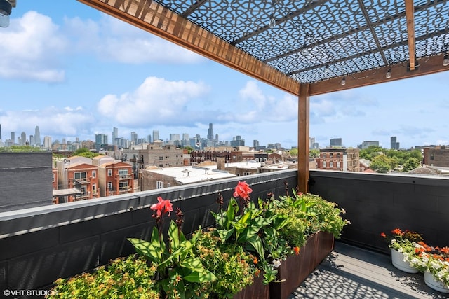 balcony featuring a city view