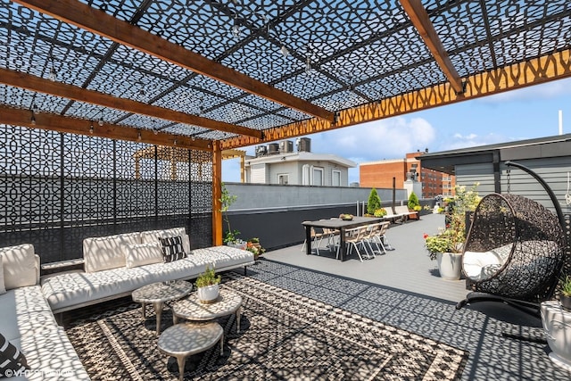 view of patio / terrace featuring outdoor lounge area, fence, a pergola, and outdoor dining space