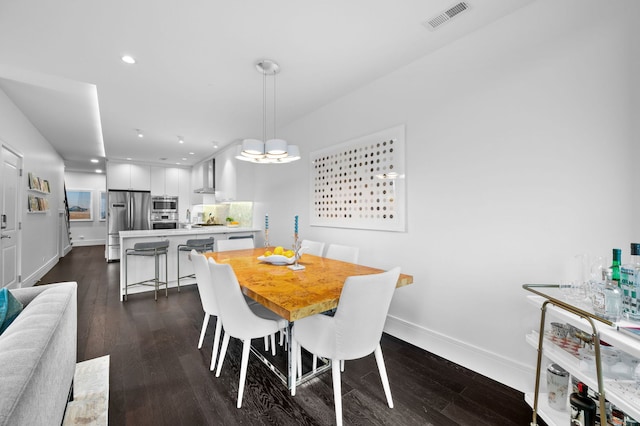 dining space with visible vents, recessed lighting, baseboards, and dark wood-type flooring