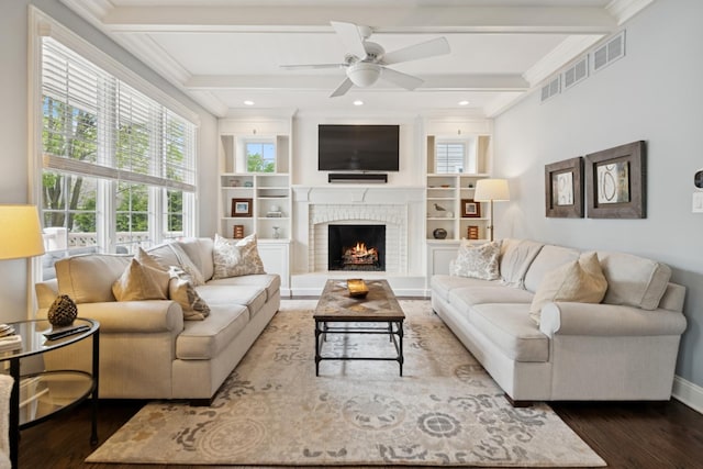 840 S Madison St, Hinsdale, IL 60521 - living area with wood finished floors, plenty of natural light, crown molding, a fireplace, and beam ceiling