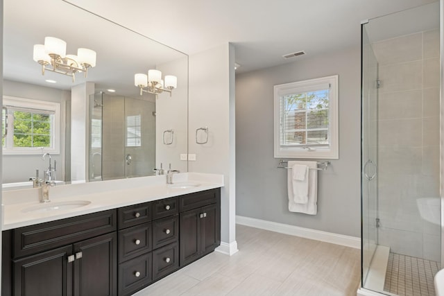840 S Madison St, Hinsdale, IL 60521 - bathroom with a chandelier, a stall shower, double vanity, and baseboards